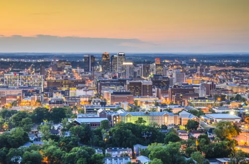 The skyline of downtown Birmingham, Alabama at sunset.