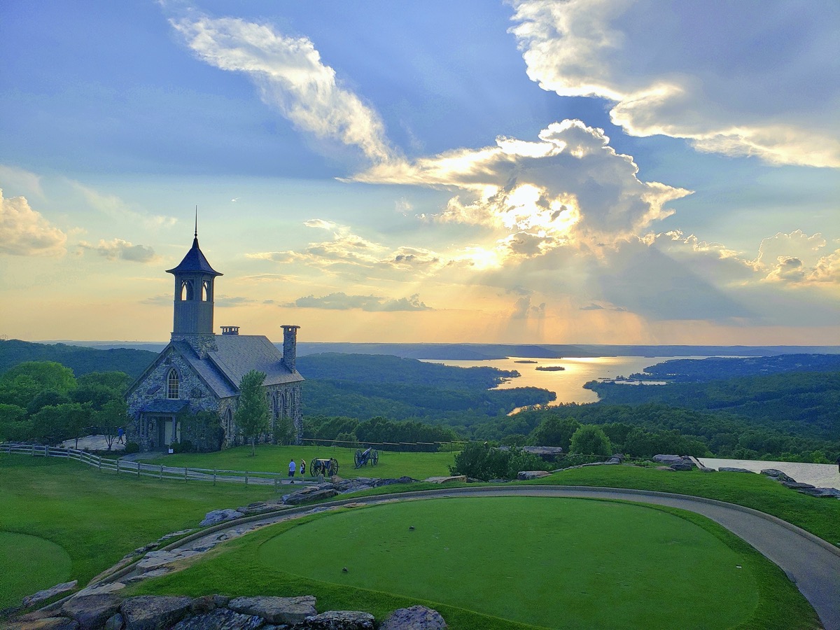 chapel of the ozarks at sunset overlooking table rock lake in missouri