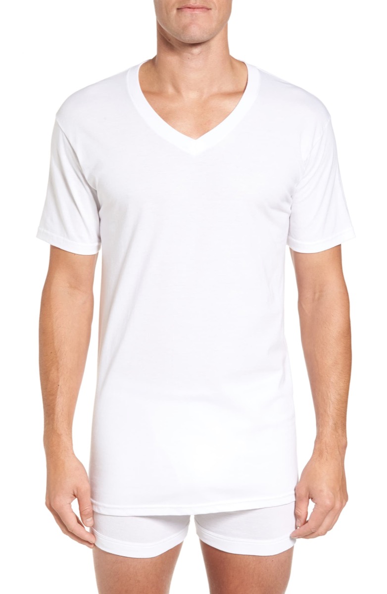 white man in white v-neck t-shirt