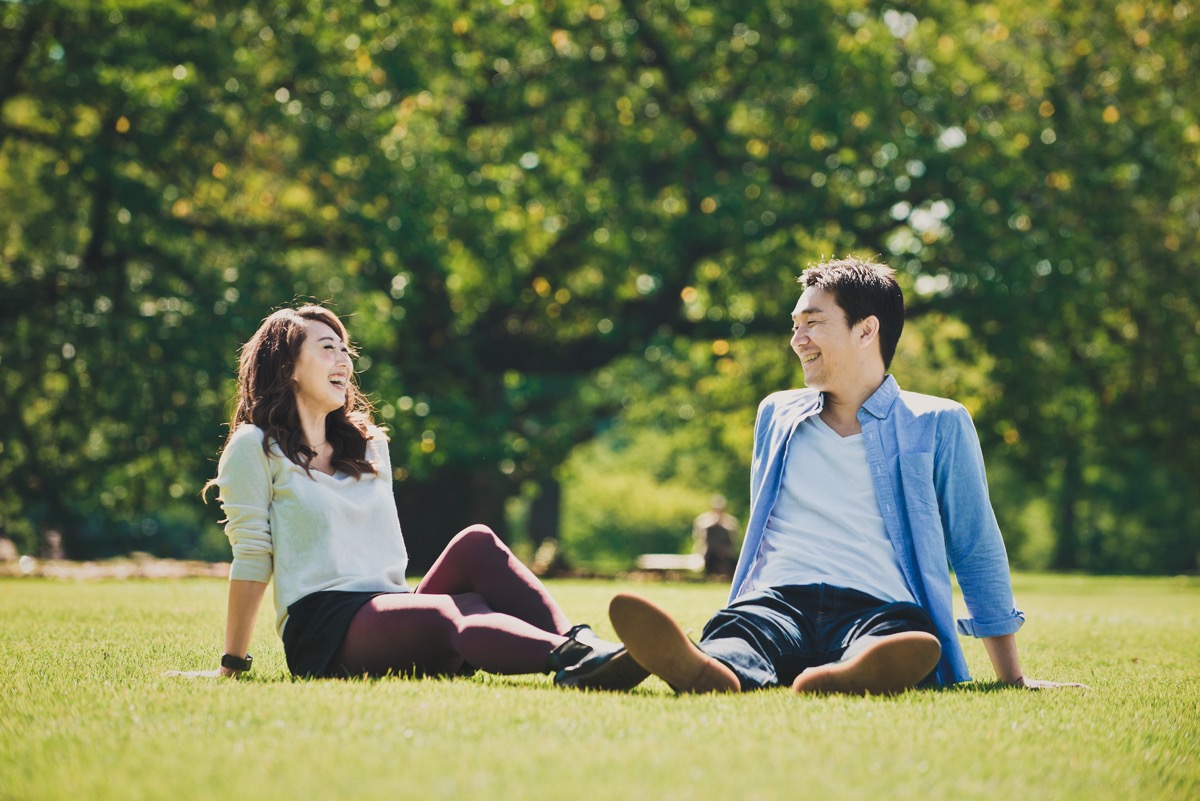 Asian man and woman in park