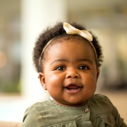 Black baby girl smiling