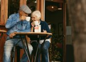 Senior couple drinking coffee at cafe