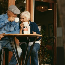 Senior couple drinking coffee at cafe