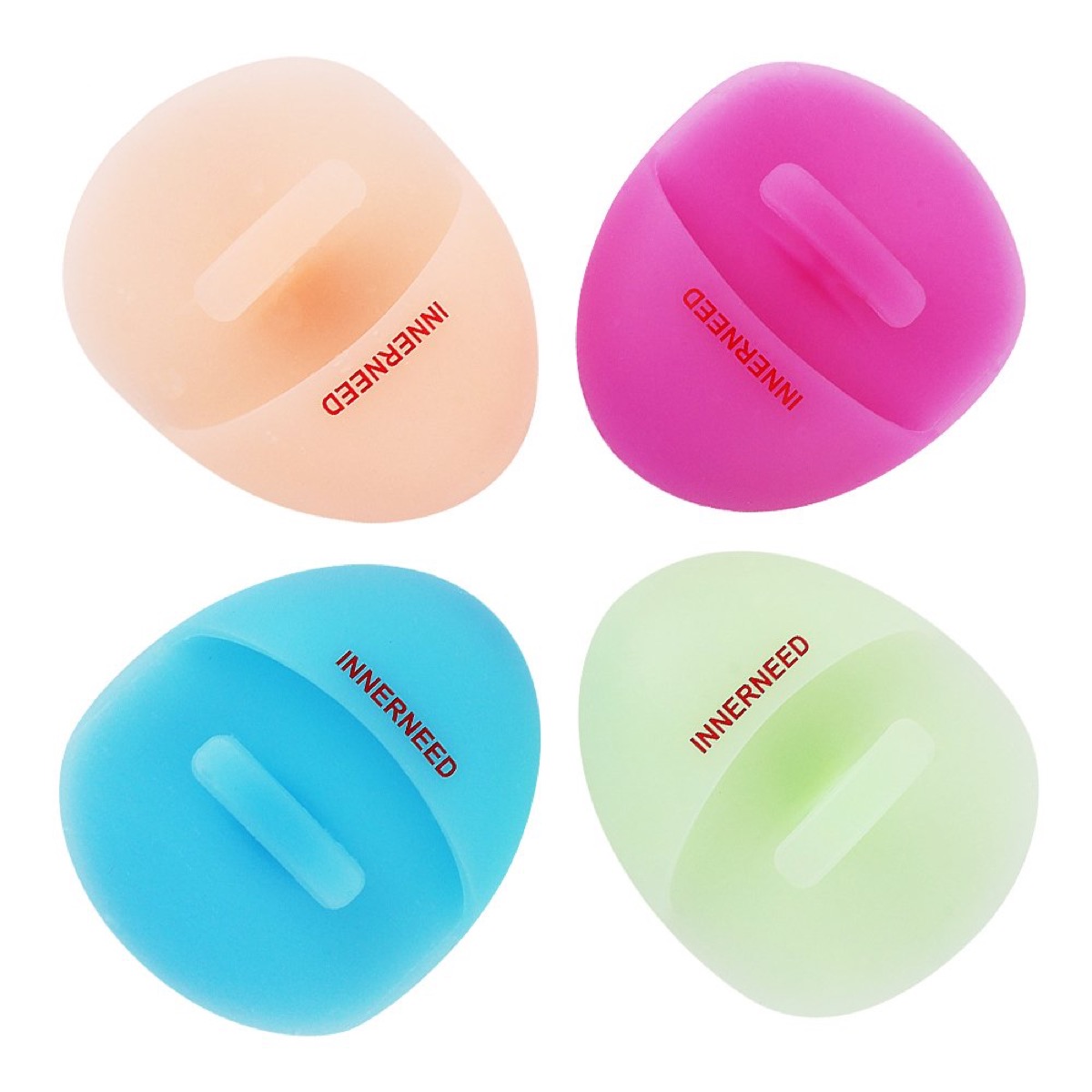 Four colorful silicone face cleansers