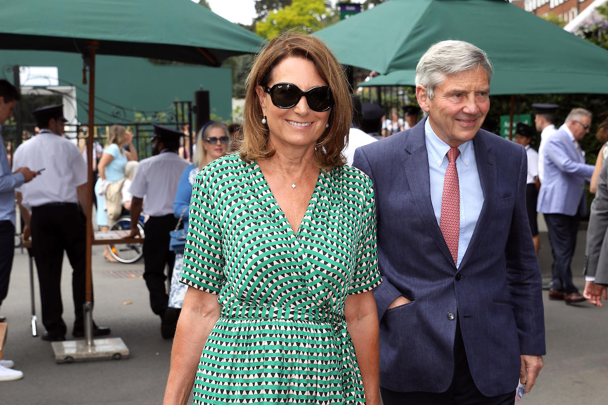 Carole Middleton (left) and Michael Middleton arrive on day nine of the Wimbledon Championships at the All England Lawn Tennis and Croquet Club, Wimbledon.