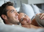 woman resting her hed on husband