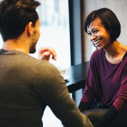 Couple laughing on a date