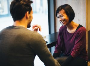 Couple laughing on a date