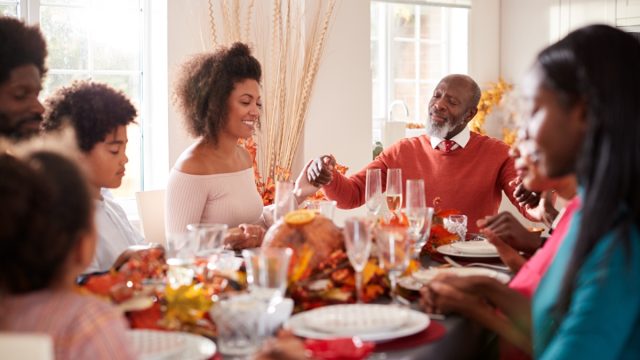 Black family members celebrating Thanksgiving