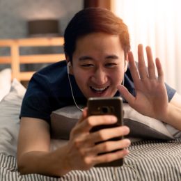 Happy man on video call