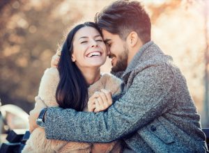 Happy couple laughing together