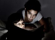 kids reading a ghost story