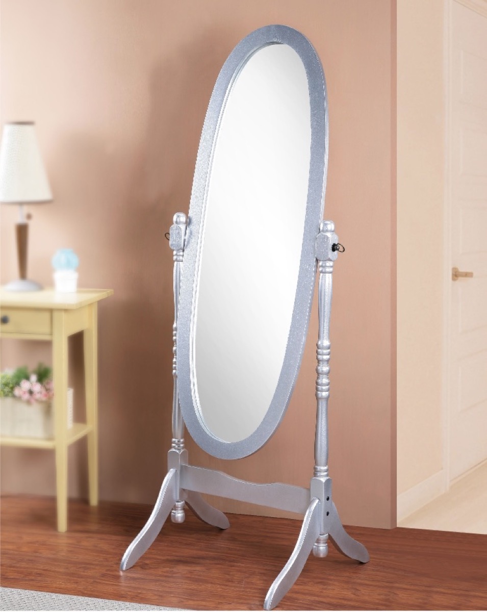 silver standing mirror