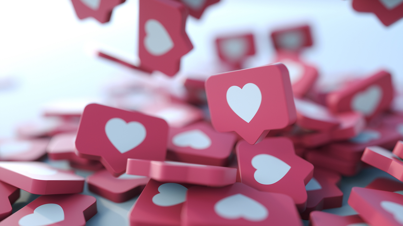A pile of 3D "like" heart icons similar to the ones seen on Instagram