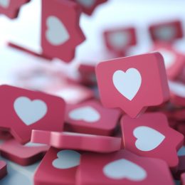 A pile of 3D "like" heart icons similar to the ones seen on Instagram