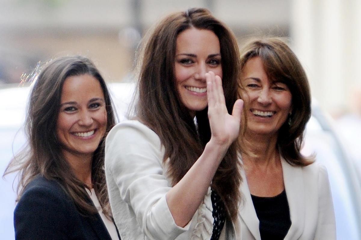 Kate Middleton (C) waves to the crowd outside the Goring Hotel, London, Great Britain, 28 April 2011. She stands with her sister Pippa (left) and her mother Carole
