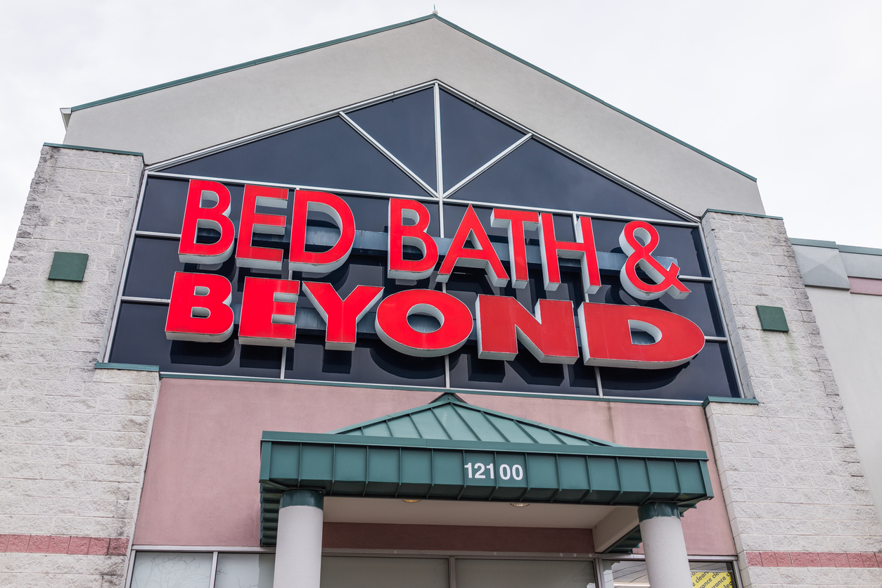 The exterior of a Bed Bath & Beyond store with red lettering