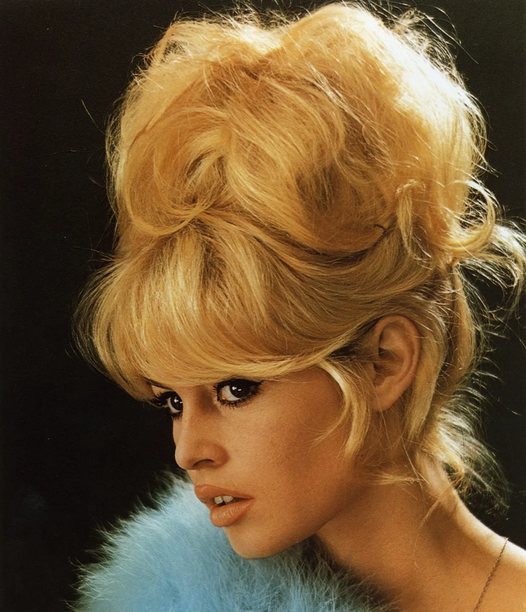 color photo of brigitte bardot with curly updo
