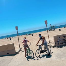 britney spears and sam asghari riding bikes at the beach
