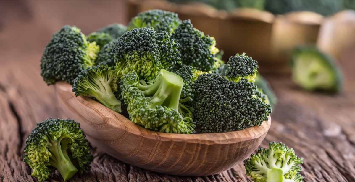 Bowl of broccoli on table
