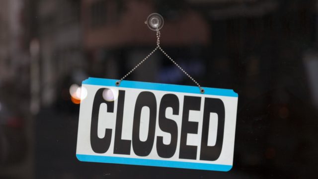 closed sign in store window