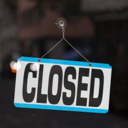 closed sign in store window