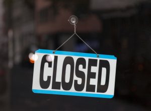 closed sign in store window