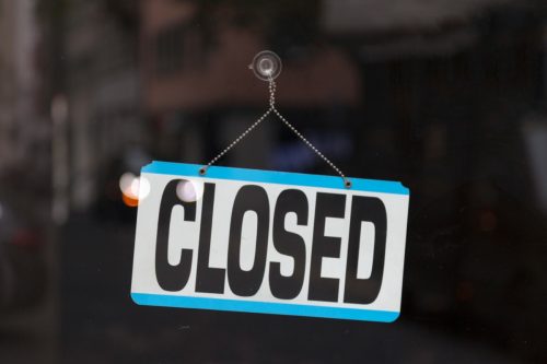 closed sign in store window