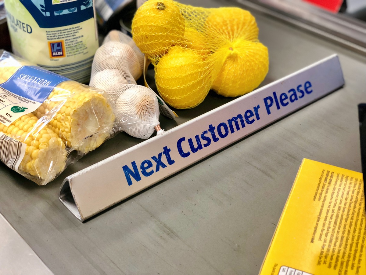 divider on conveyer belt at grocery store checkout