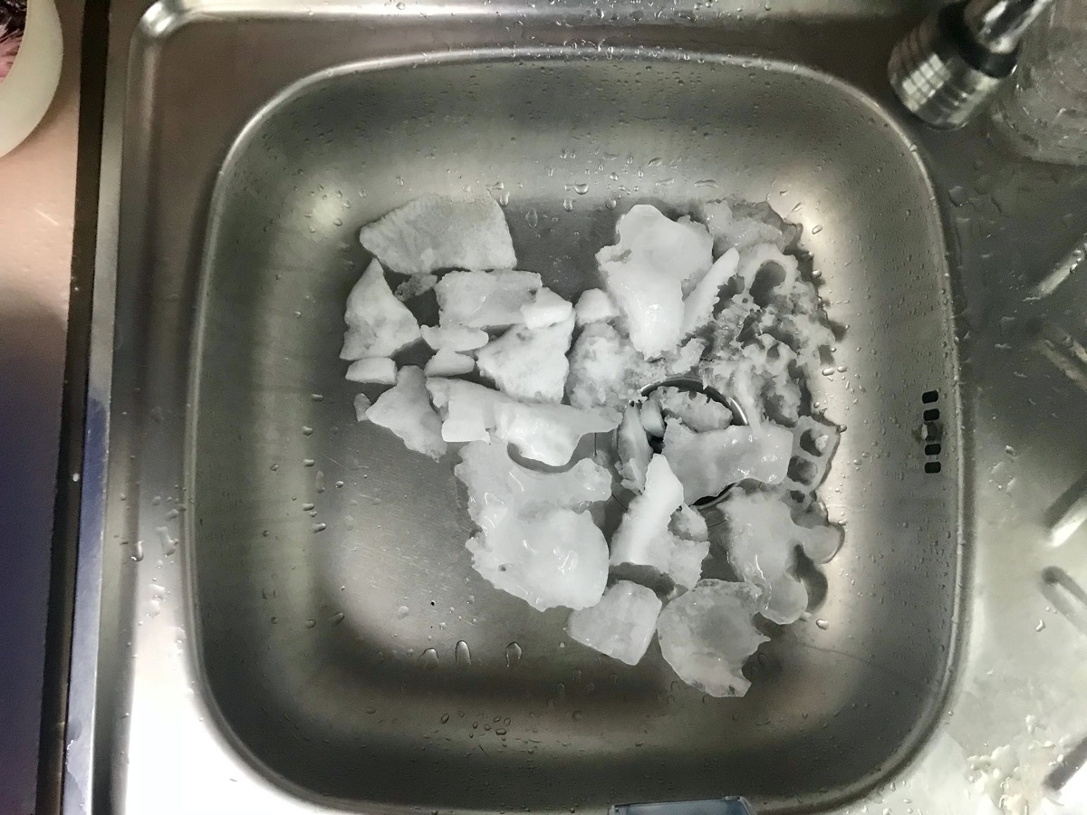 ice cubes in metal sink