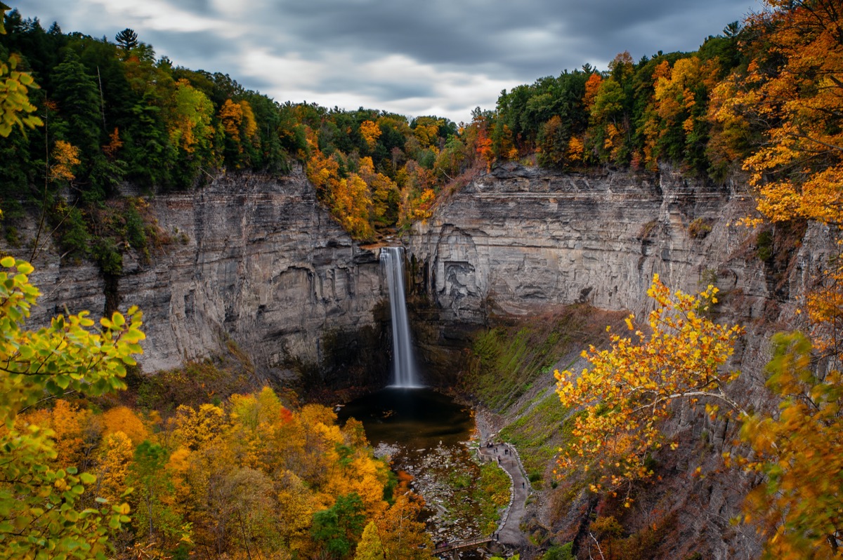 waterfall and autumn trees at Taughannock Falls State Park in Ithaca, New York
