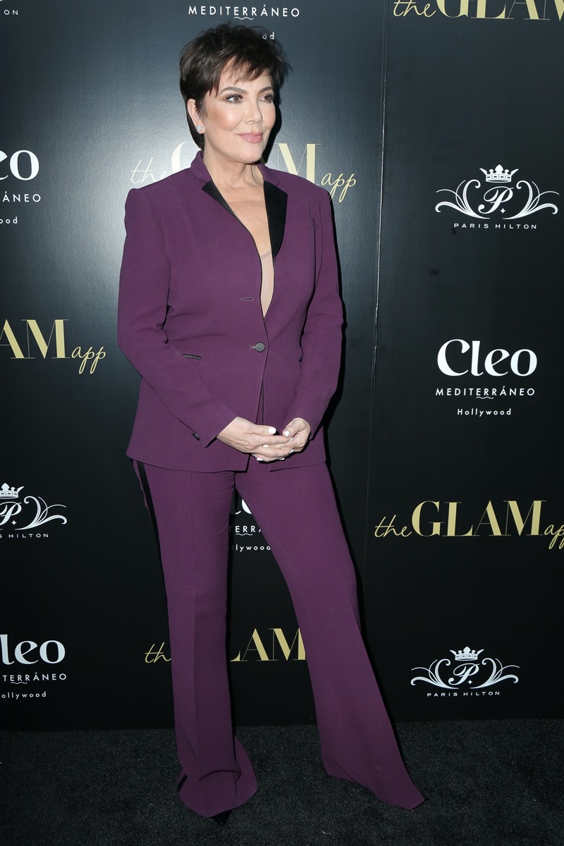 Kris Jenner wears a purple suit at the Glam App Celebration Event in 2019