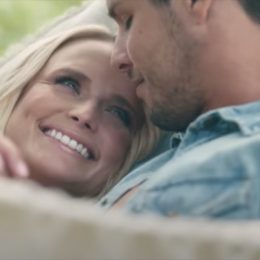 miranda lambert and husband brendan mcloughlin smiling in settling down music video