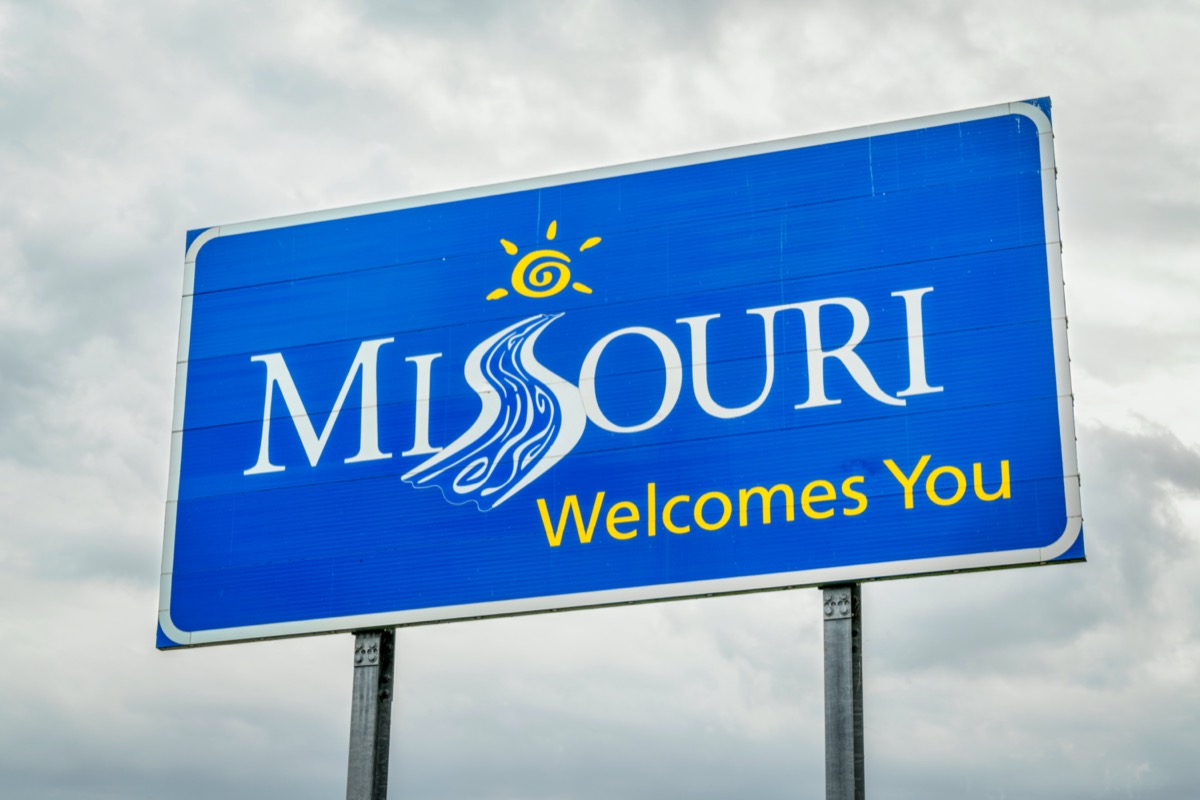 a blue "Missouri Welcomes You" sign