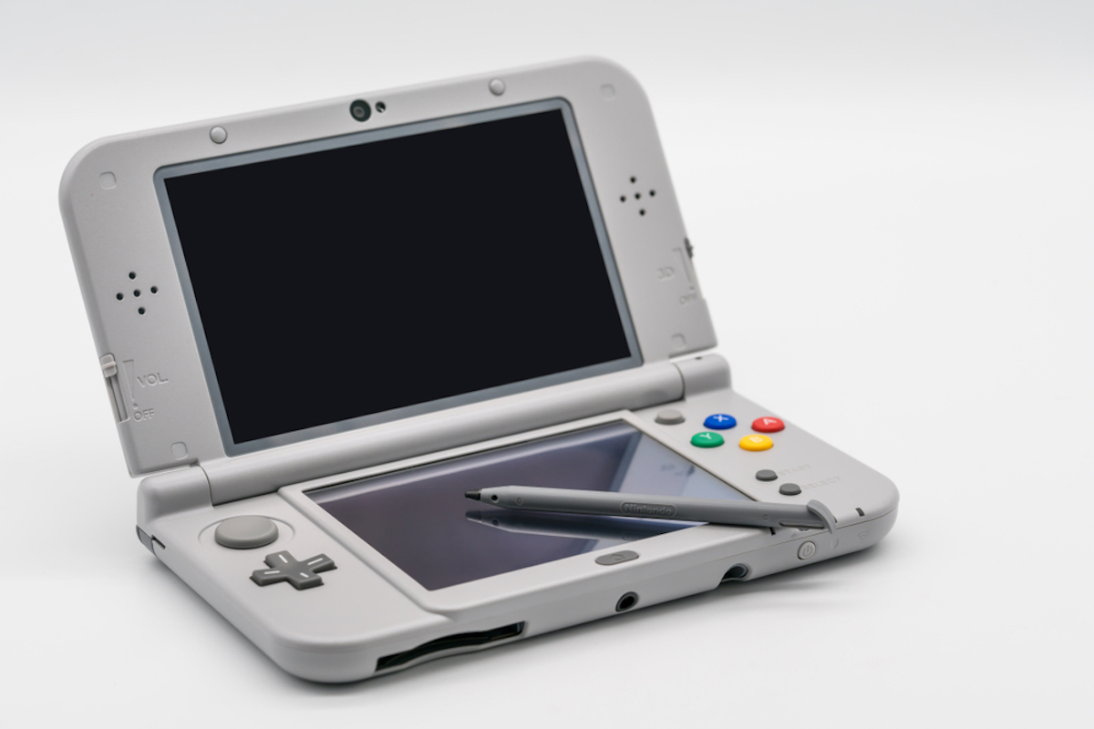Nintendo 3DS LL Super Famicom Edition. Portable game by Nintendo.