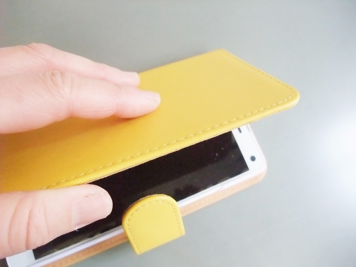 yellow leather wallet cover of smartphone