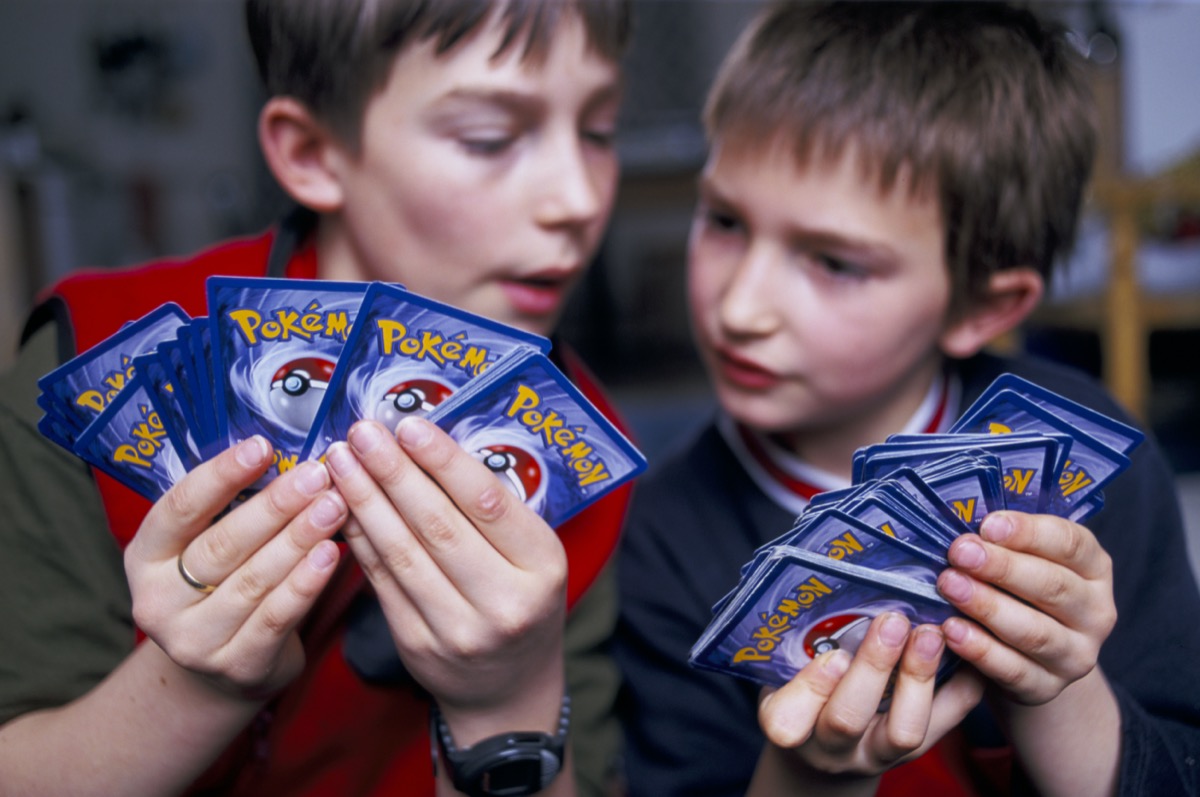 children playing with pokemon cards