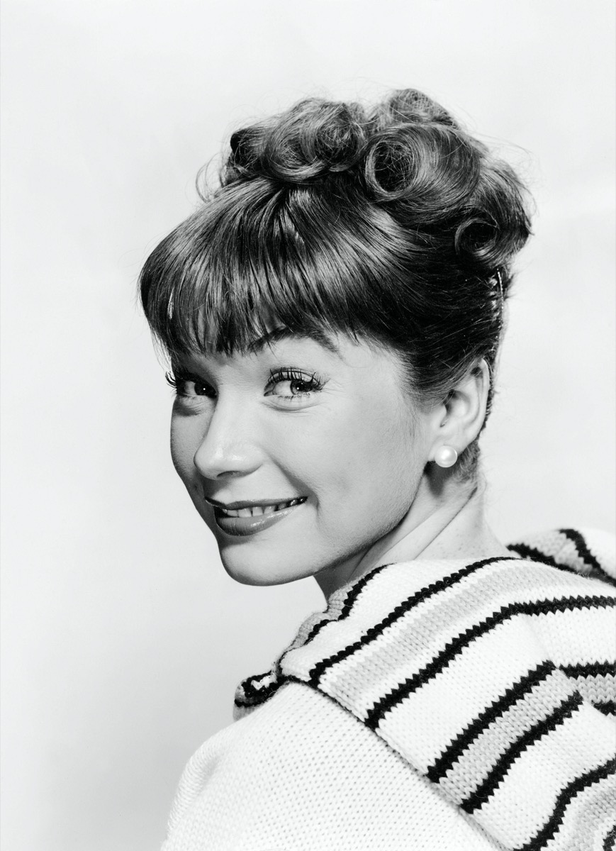shirley maclaine with an updo and short bangs