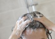 Closeup of a woman washing her hair.