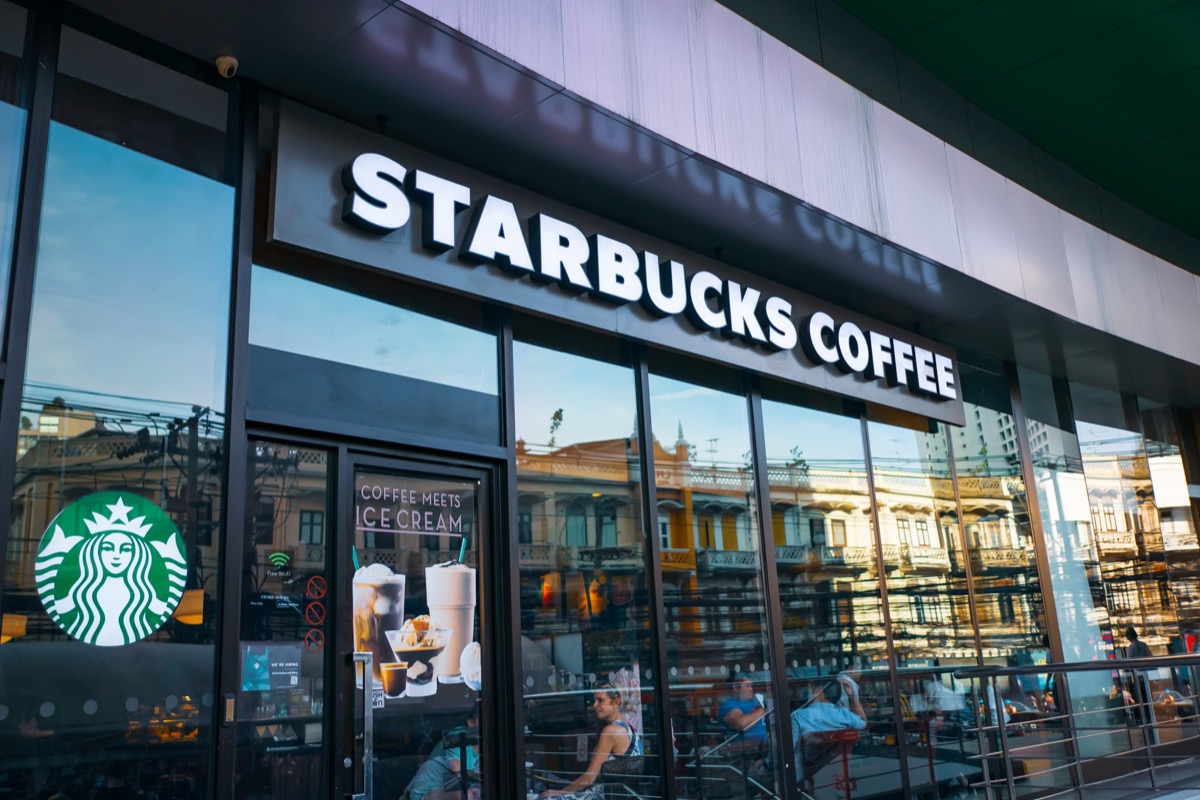 Bangkok, Thailand - July 19, 2019 : Starbucks coffee logo in front of the shop in Bangkok.