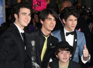 Jonas Brothers with brother Frankie