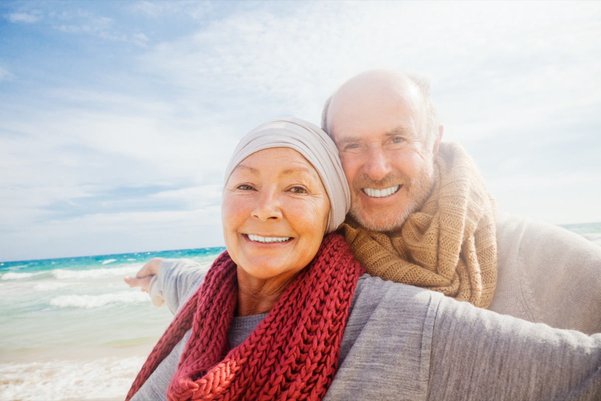 Mature man and woman on beach