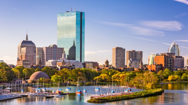 The skyline of Boston, Massachusetts as seen from the Charles River at sunset
