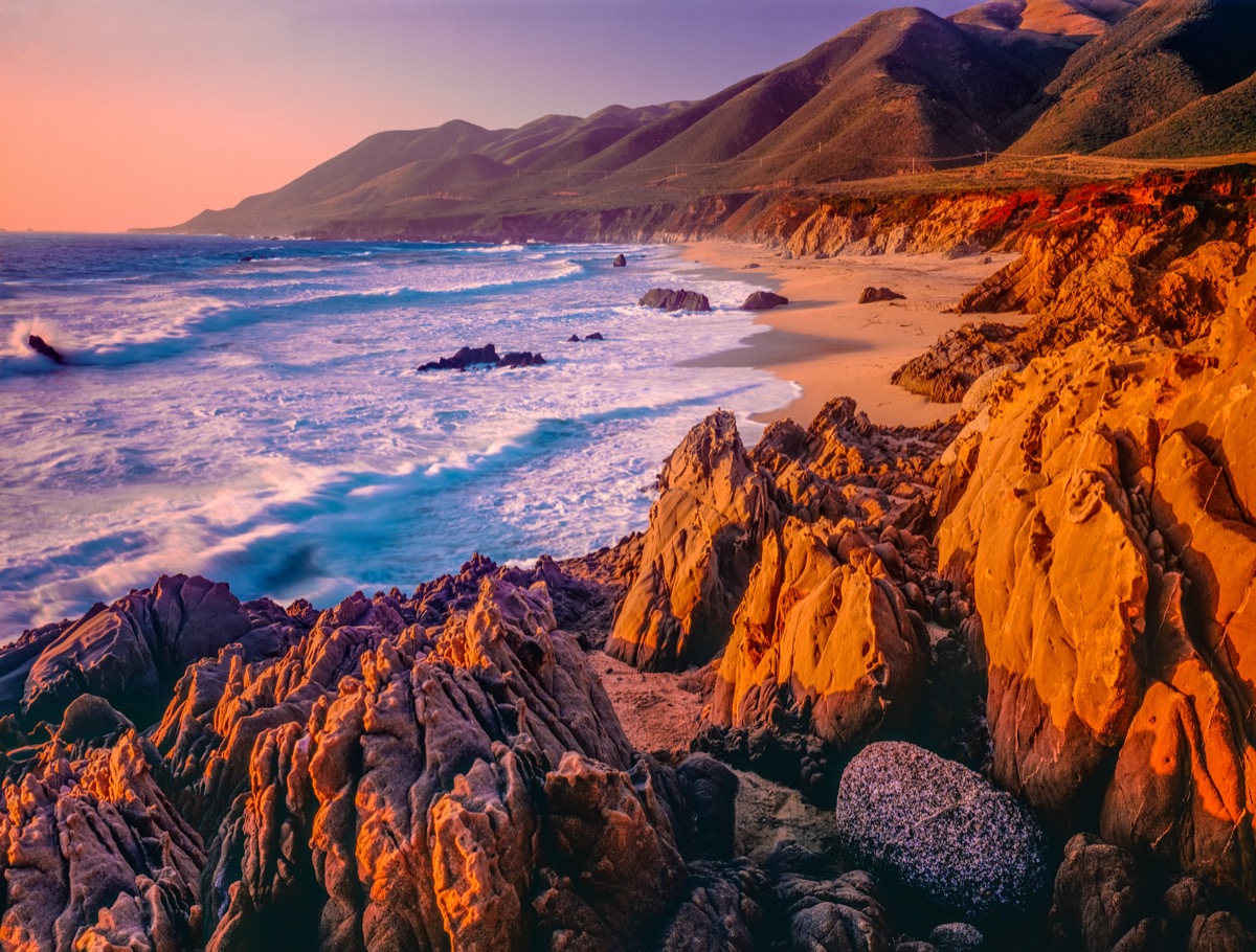 rocks and mountains on the Big Sur street in Carmel, California at dusk