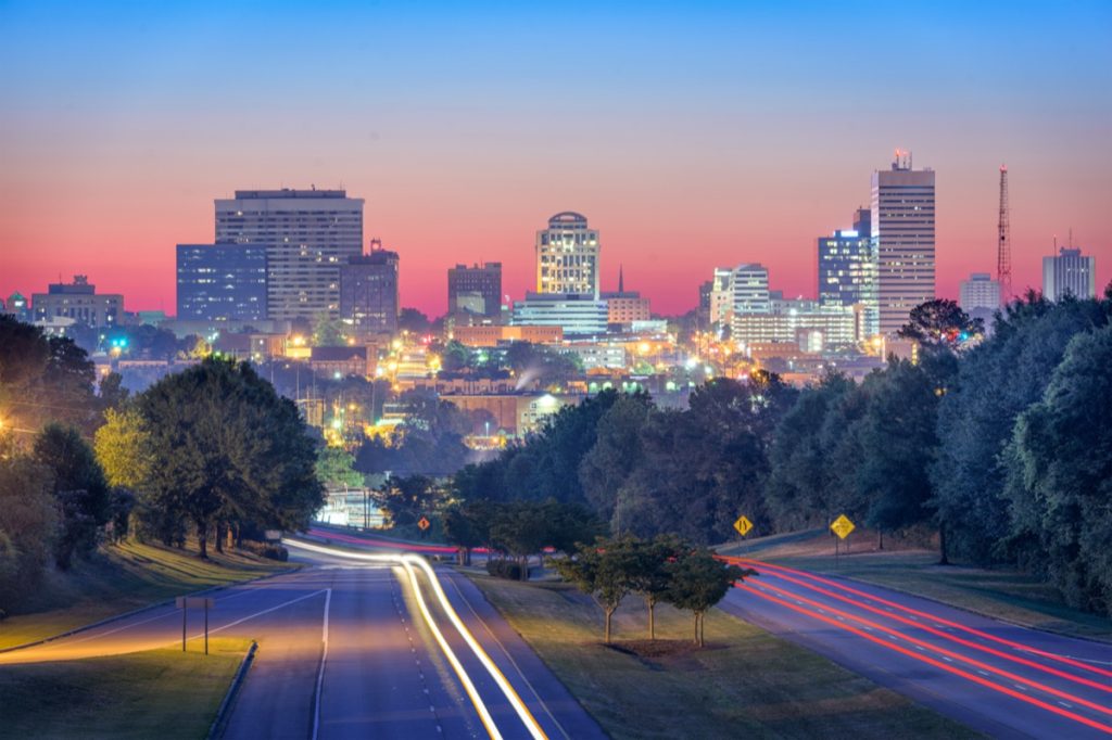 city skyline and highway in Columbia, South Carolina at night