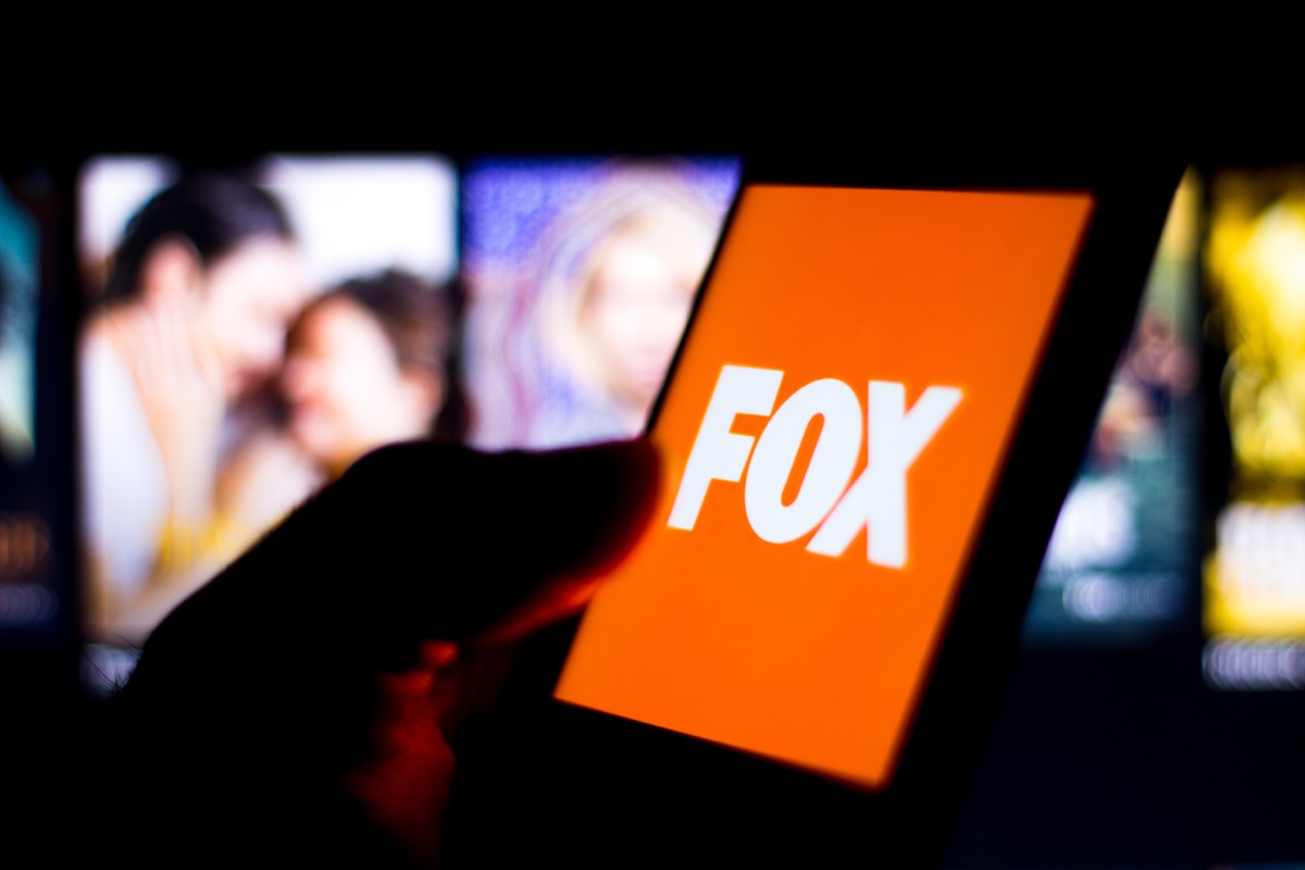Photo illustration the Fox Broadcasting Company logo seen displayed on a smartphone.