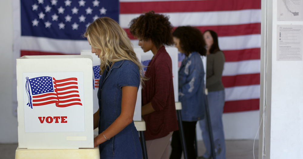 women voting at voting booth