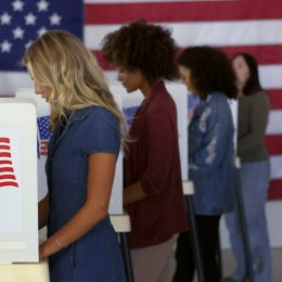 women voting at voting booth