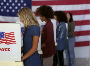 women voting at voting booth