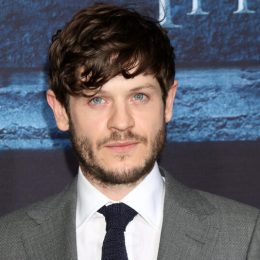 Actor Iwan Rheon on the red carpet at a Game of Thrones premiere.